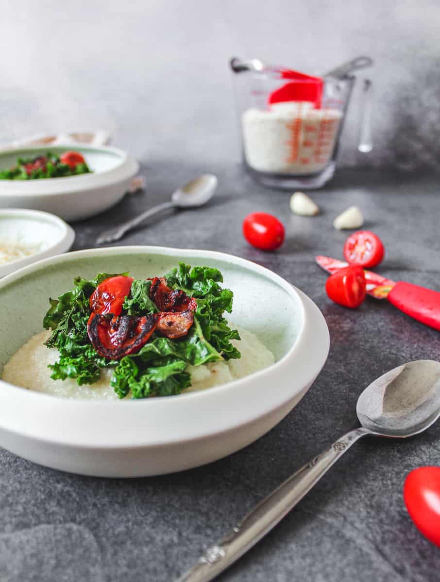 Cheesy Garlic Grits with Kale and Tomatoes