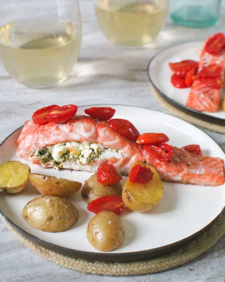 One Pan Salmon and Goat Cheese with tomatoes on a plate
