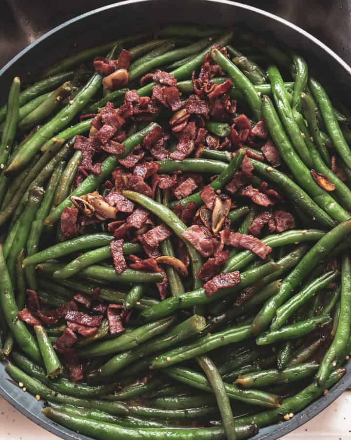 Top view of Green Beans with turkey bacon in pan