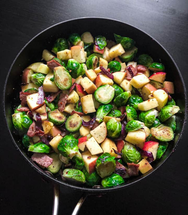 Red Wine Brussels Sprouts cooking in skillet