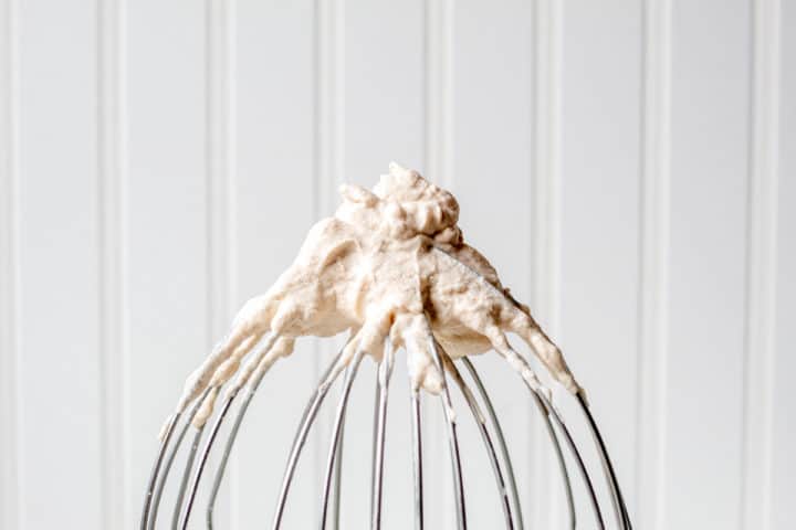 drunken whipped cream at the end of a whisk